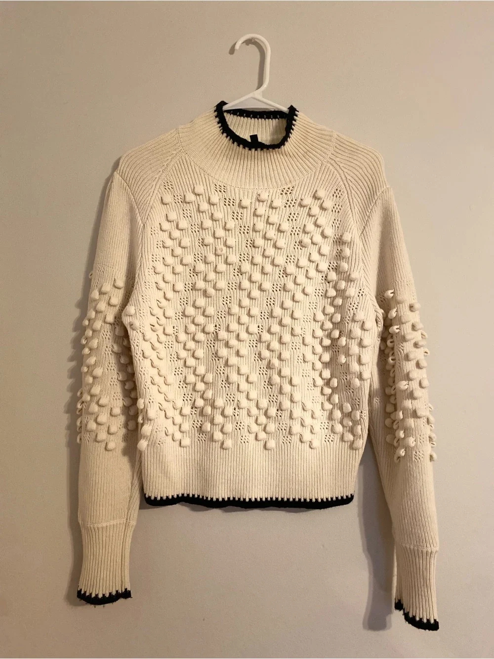 BCBGMaxAzria Cream Pom-Pom Knit Sweater with Black Trim - Picture 1 of 6